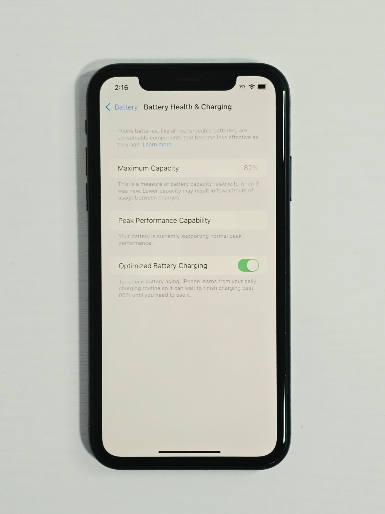 iPhone XR · Black · 64 GB · Used · Good · Battery Health: 82% · Refurbished — photo 4 of 4