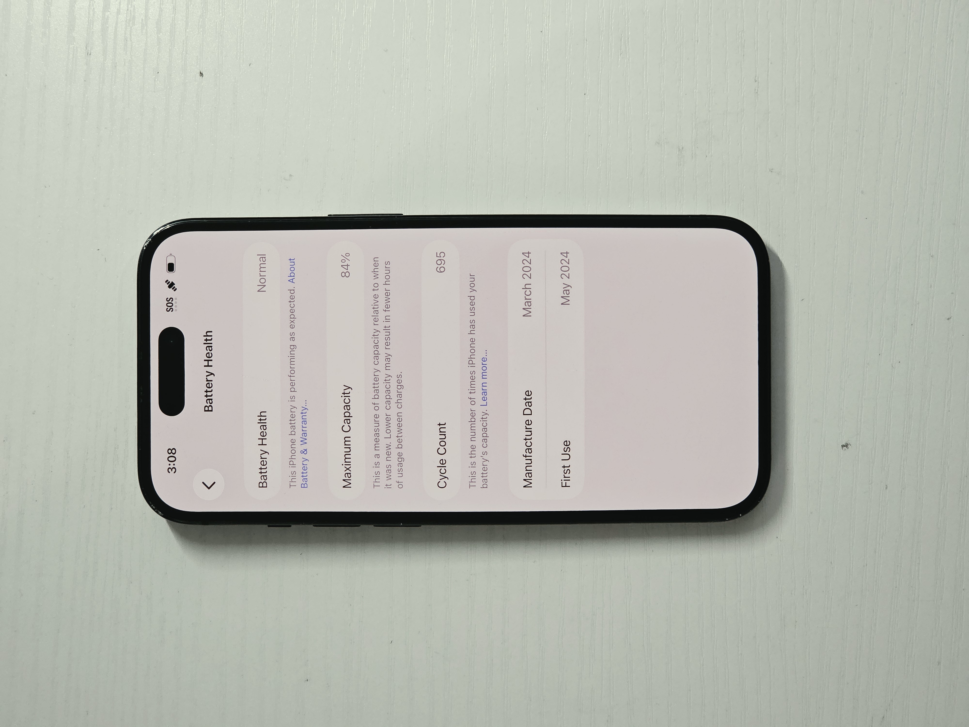 iPhone 15 · Black · 128GB · Used · Excellent · Battery Health: 84% — photo 3 of 4