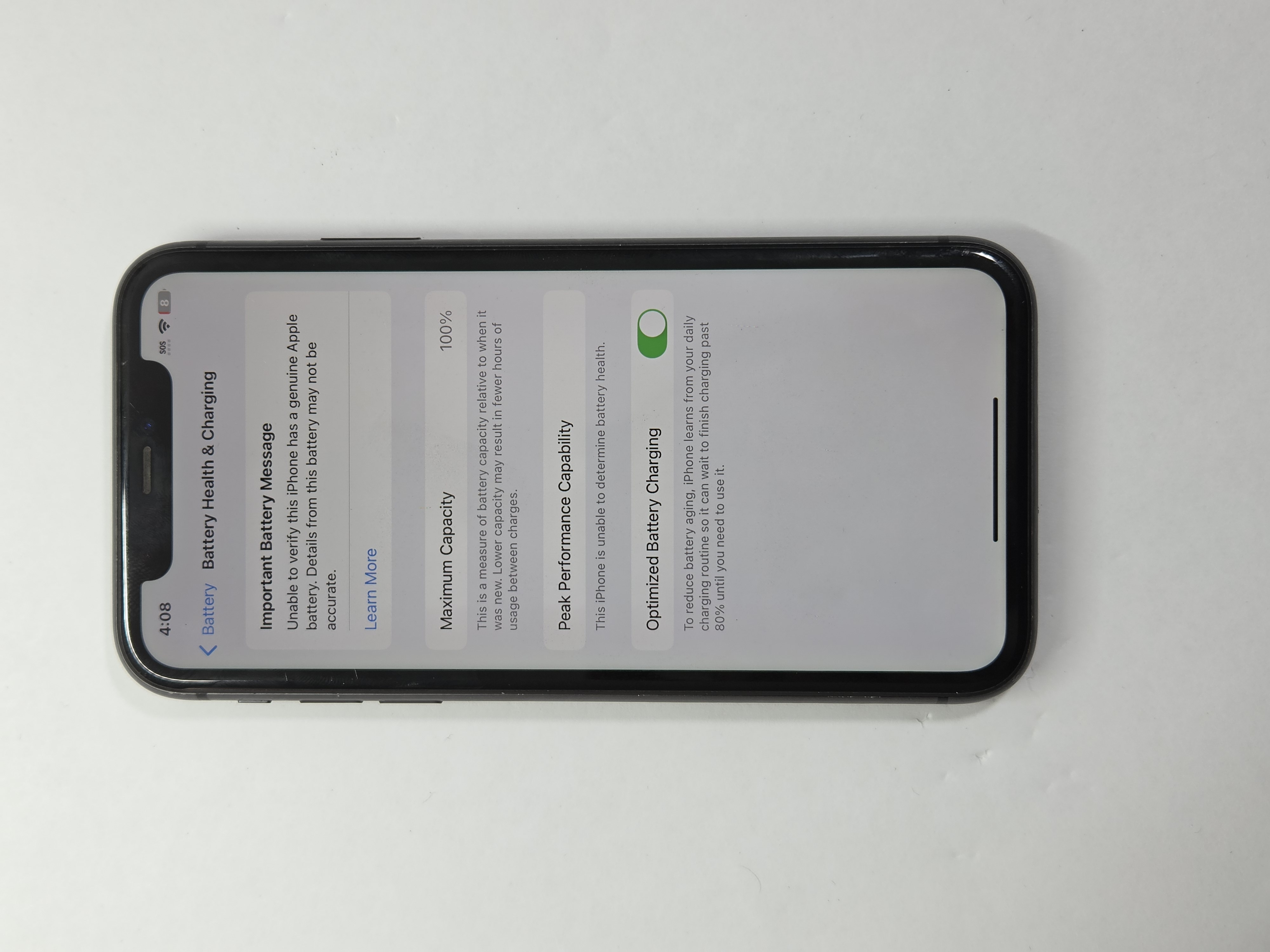 iPhone 11 · Black · 64 GB · Used · Excellent · Battery Health: 100% · Refurbished — photo 3 of 4
