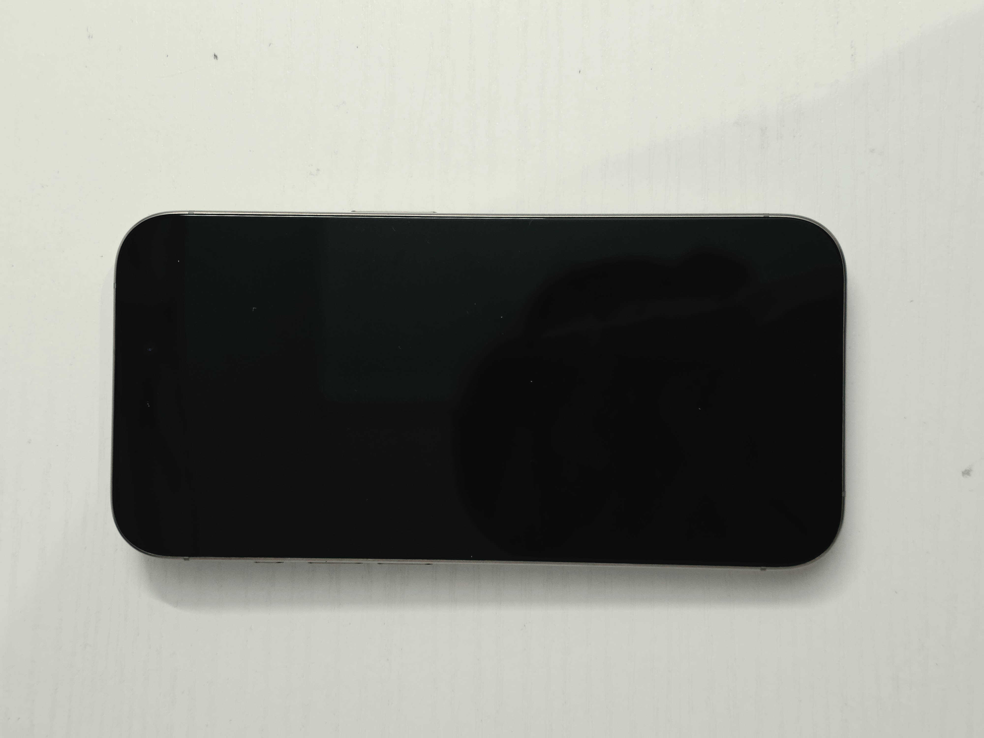 iPhone 15 Pro · Natural Titanium · 128 GB · Used · Like New · Battery Health: 87% · Previous Repairs — photo 2 of 4