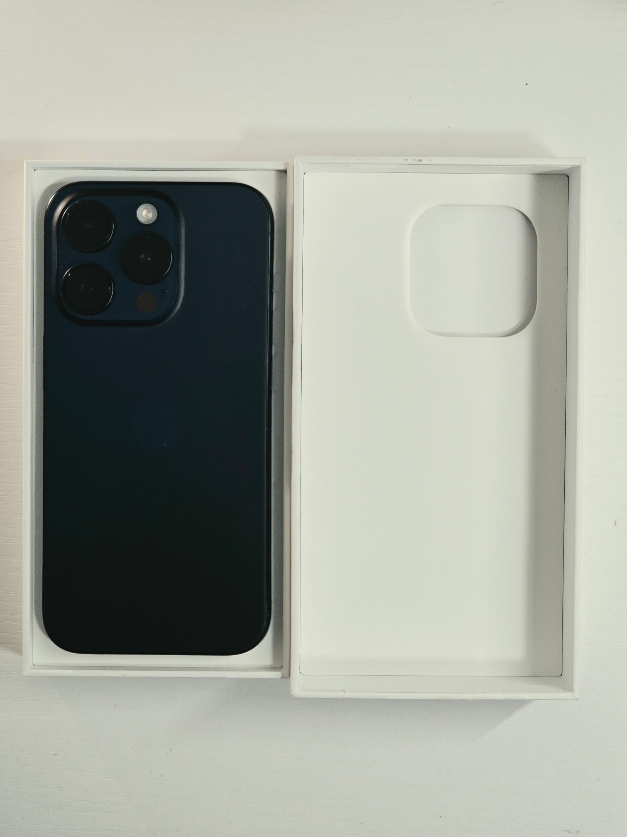 iPhone 15 Pro · Blue Titanium · 128 GB · Used · Excellent · Battery Health: 98% · Refurbished — photo 1 of 4