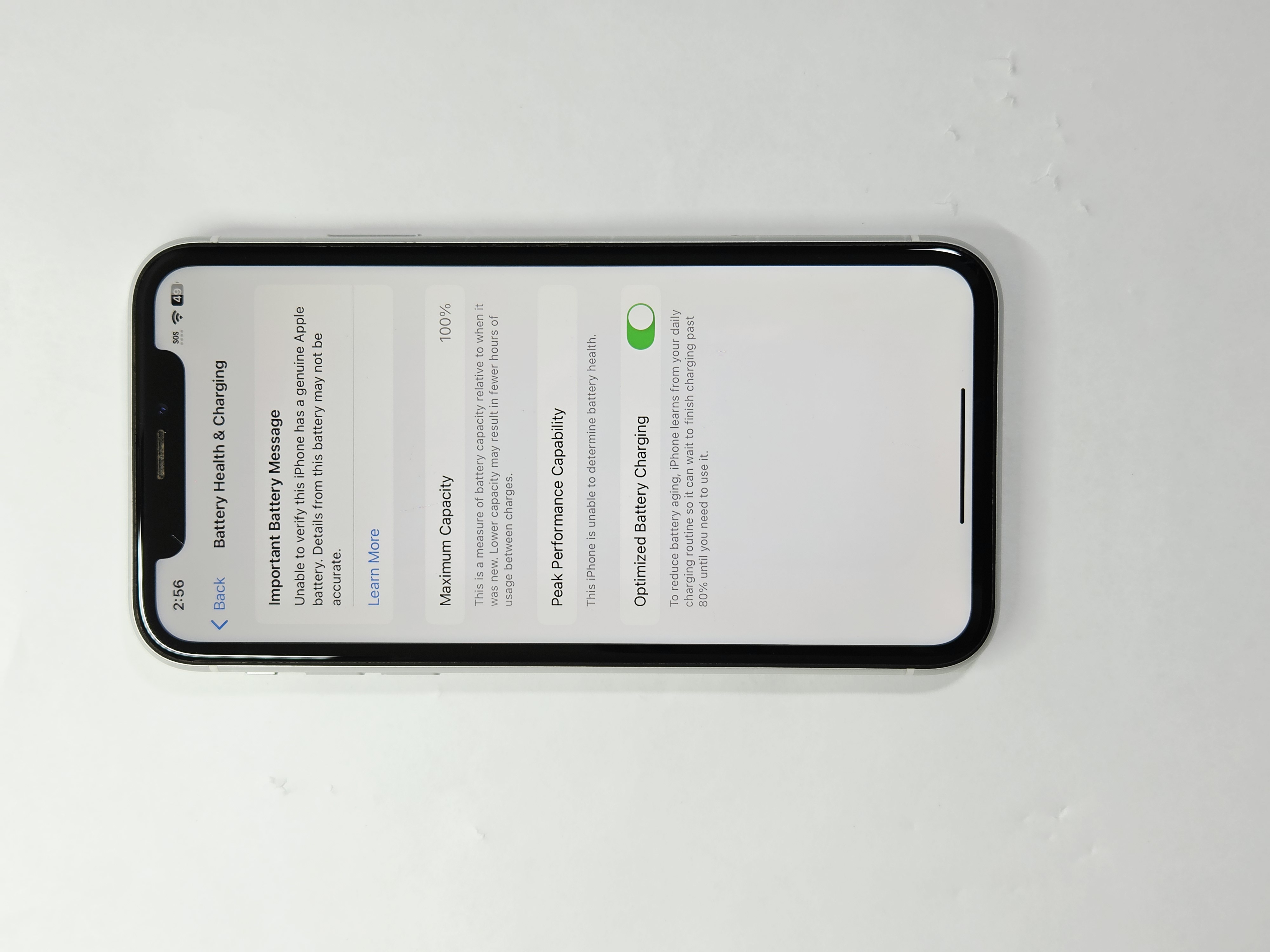 iPhone XR · White · 128 GB · Used · Excellent · Battery Health: 100% · Refurbished — photo 3 of 4