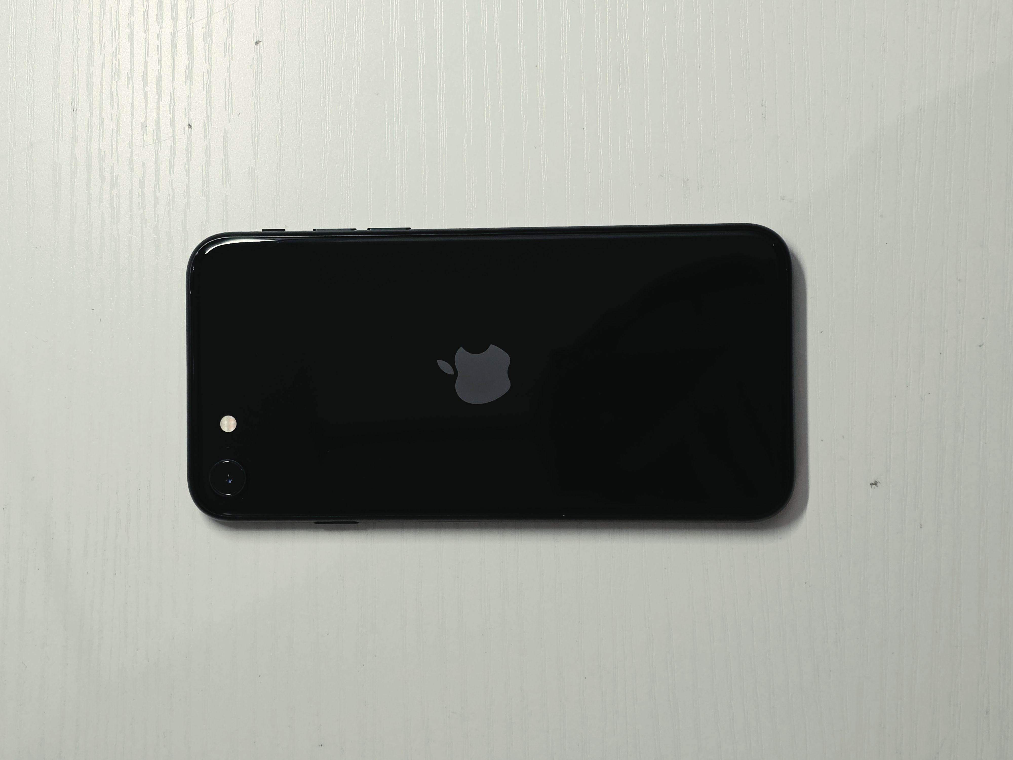 iPhone SE (2022) · Black · 128GB · Used · Like New · Battery Health: 88% — photo 1 of 4