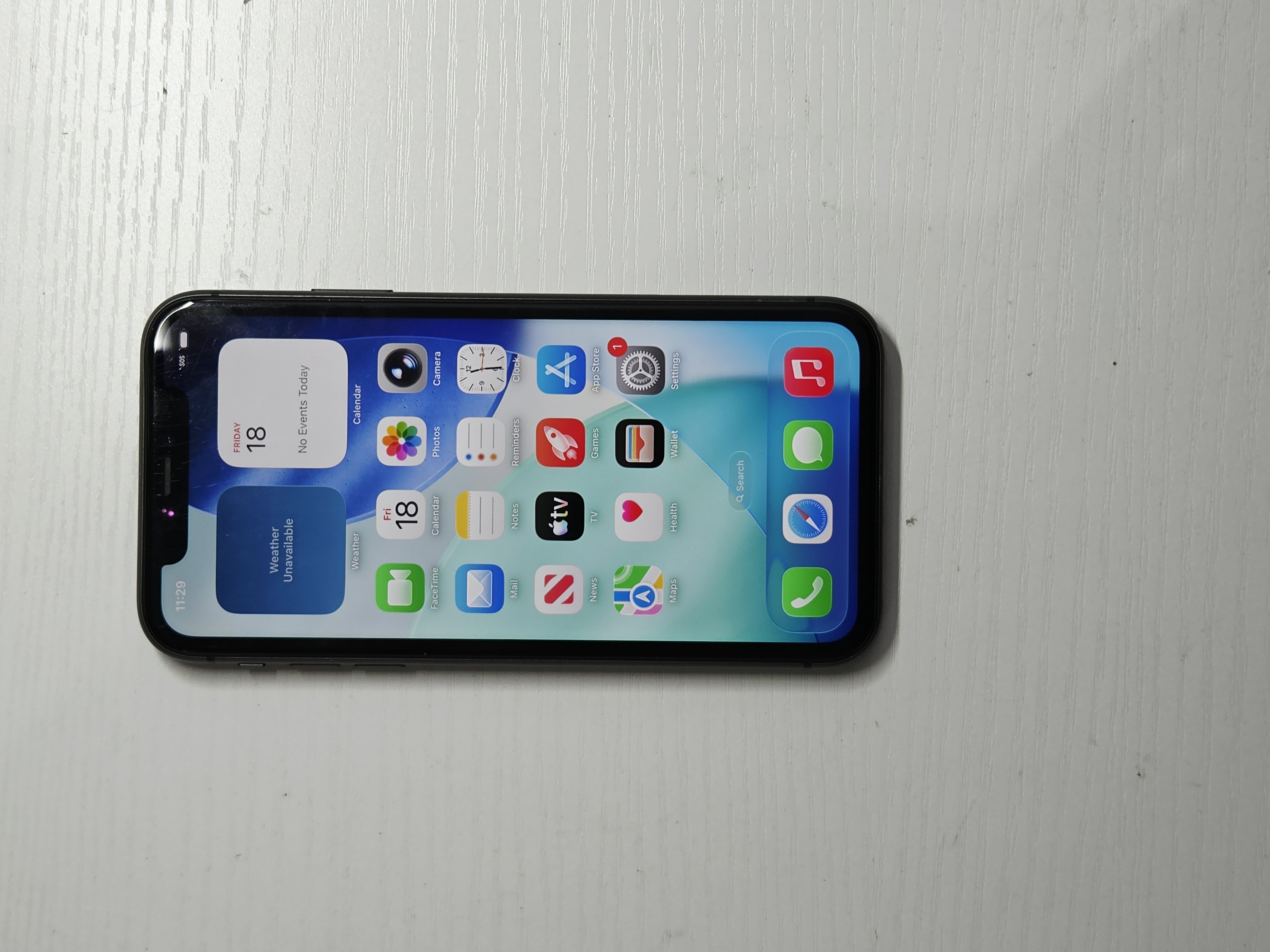 iPhone 11 · Black · 64 GB · Used · Good · Battery Health: 99% · Refurbished — photo 2 of 4