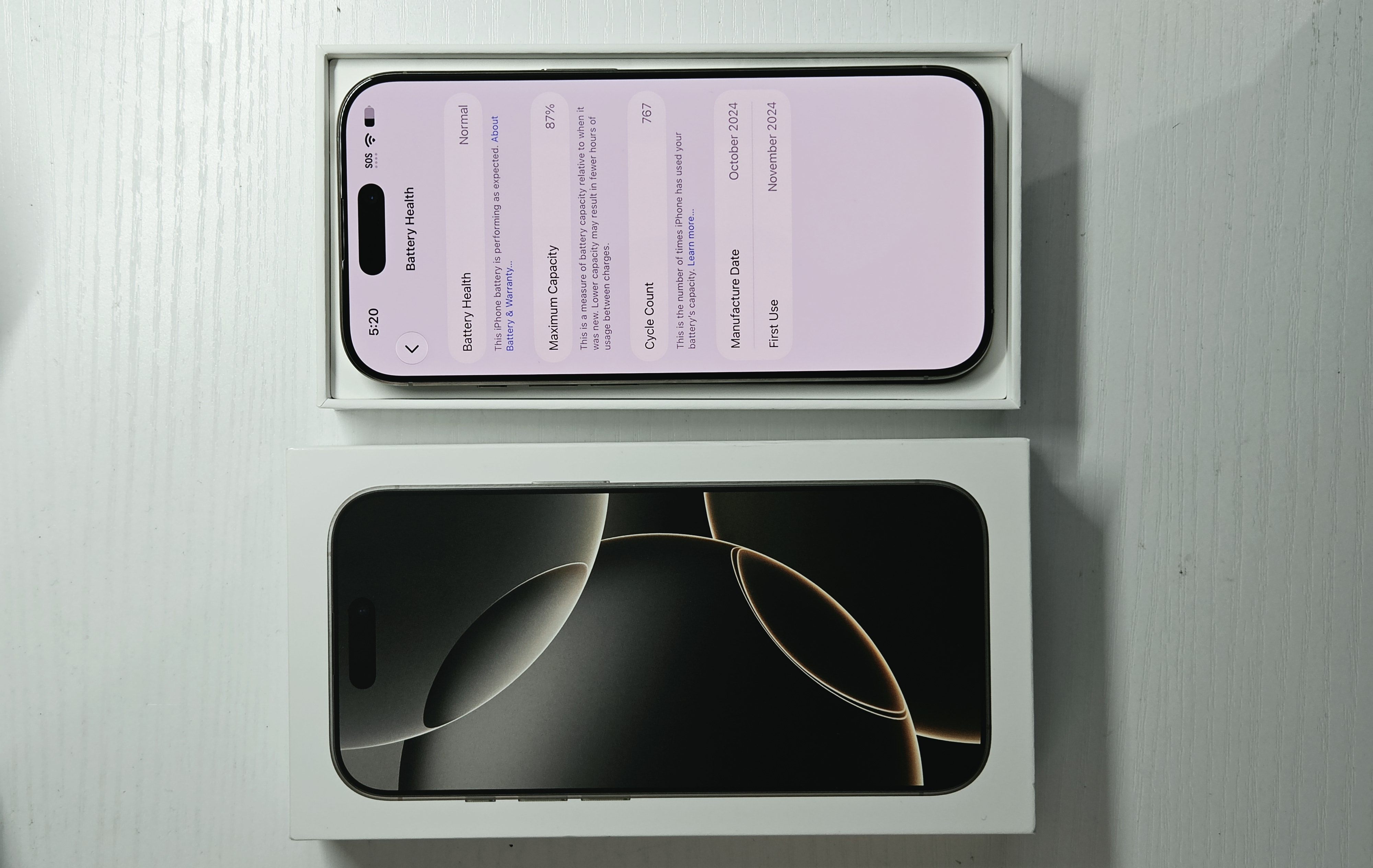 iPhone 16 Pro · Natural Titanium · 128 GB · Used · Like New · Battery Health: 87% — photo 3 of 4