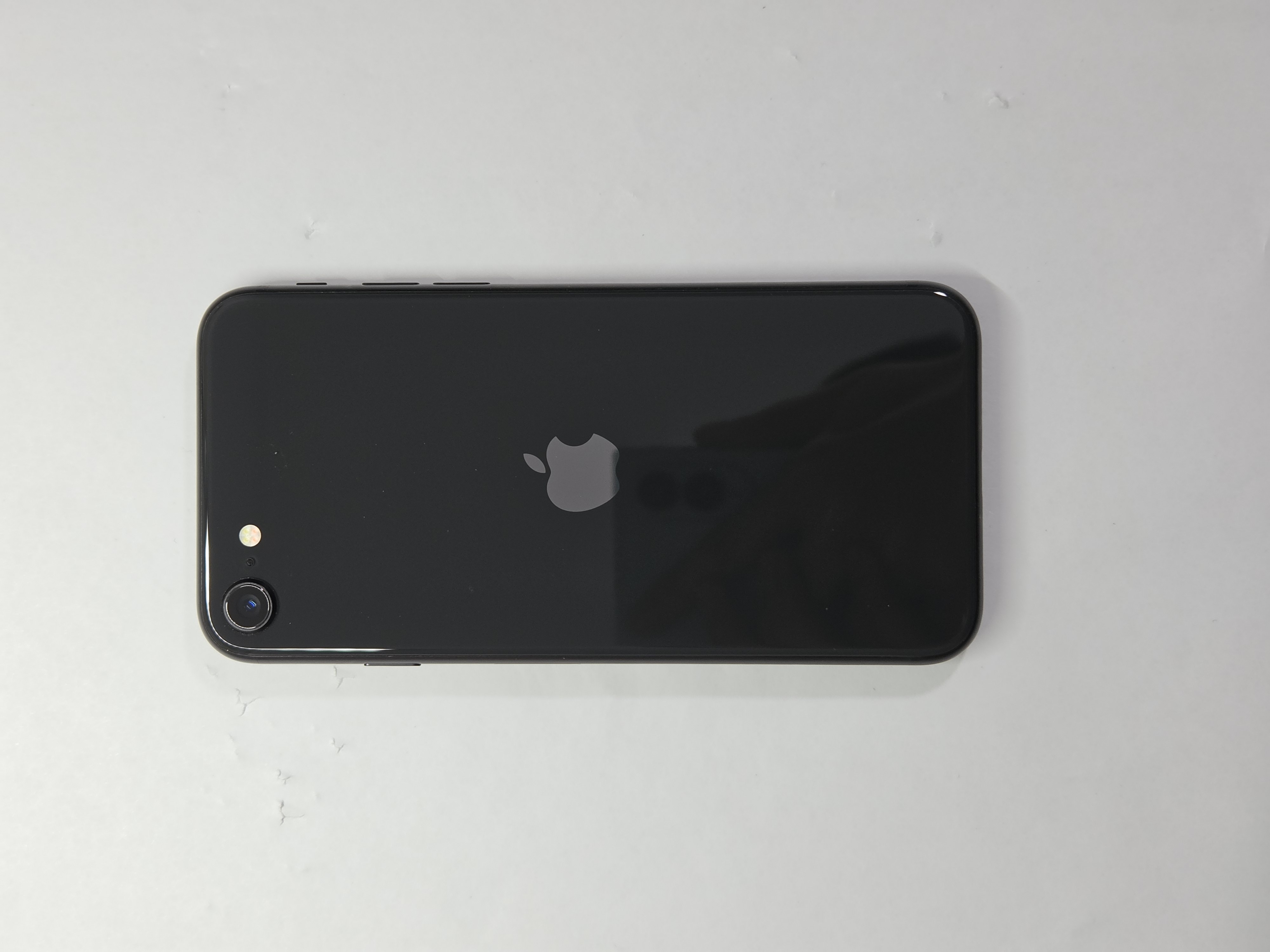 iPhone SE (2020) · Black · 64 GB · Used · Excellent · Battery Health: 83% — photo 1 of 4