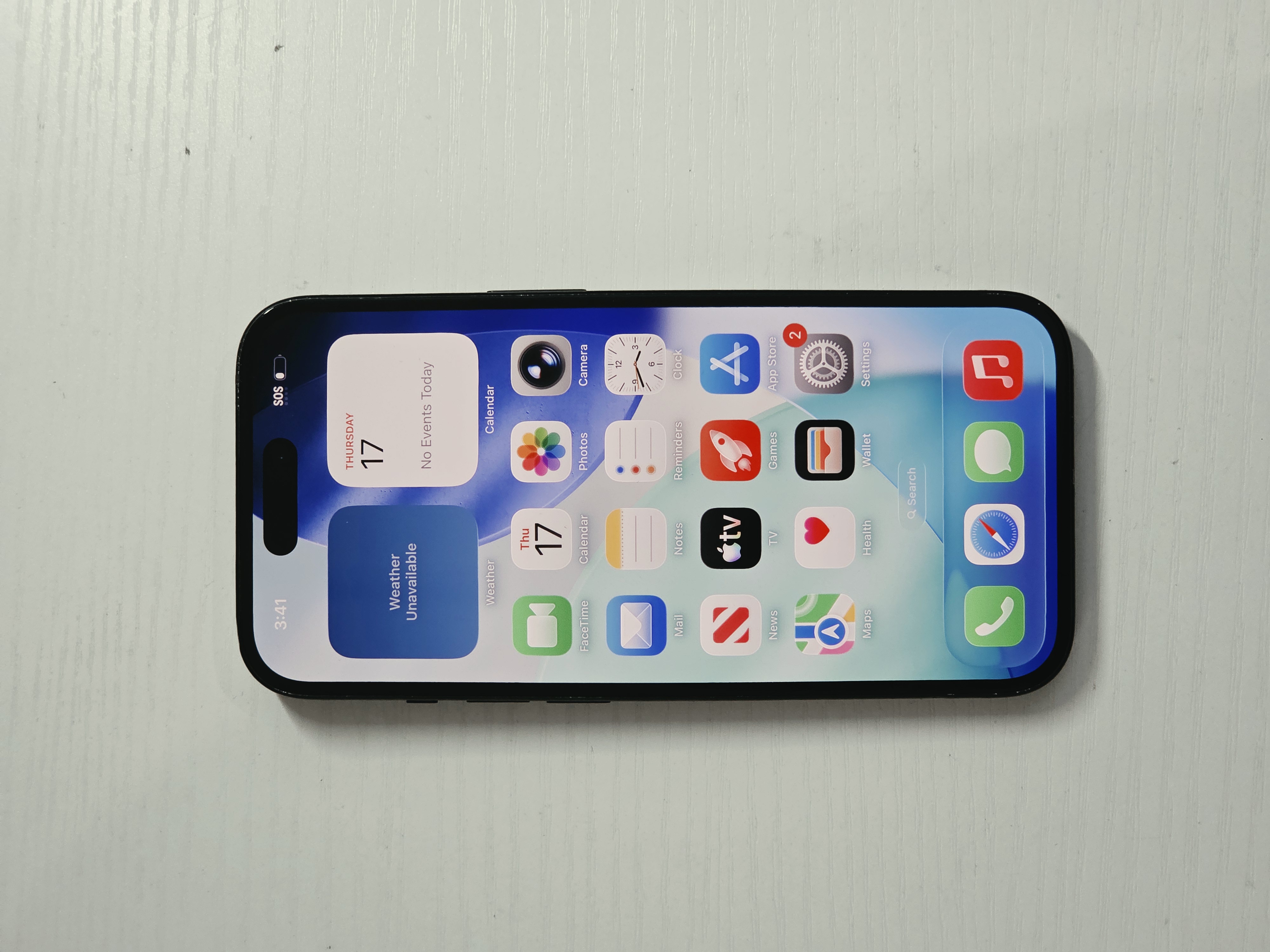 iPhone 15 · Black · 128GB · Used · Excellent · Battery Health: 82% — photo 2 of 4