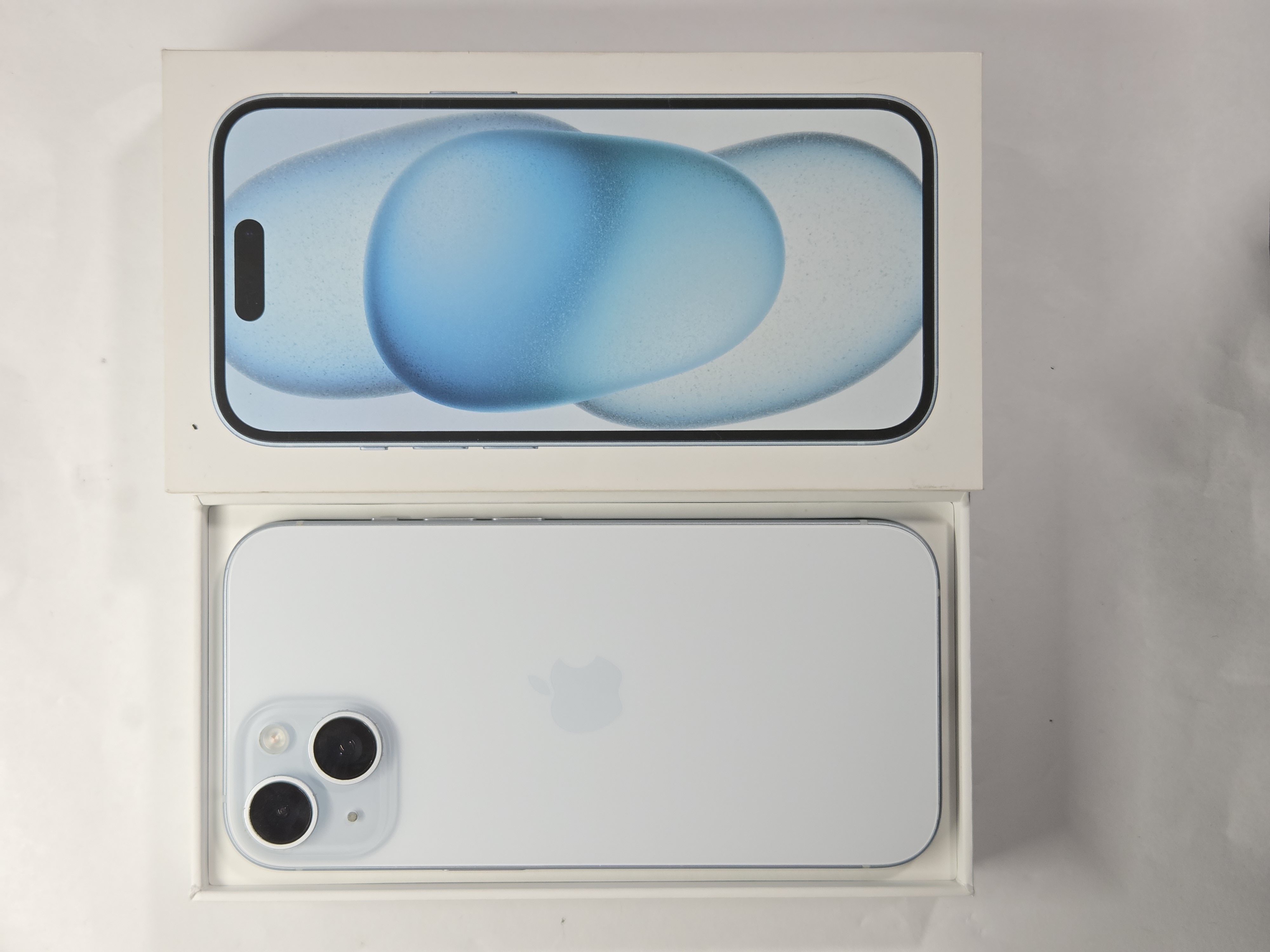 iPhone 15 · Blue · 128 GB · Used · Like New · Battery Health: 83% — photo 1 of 4