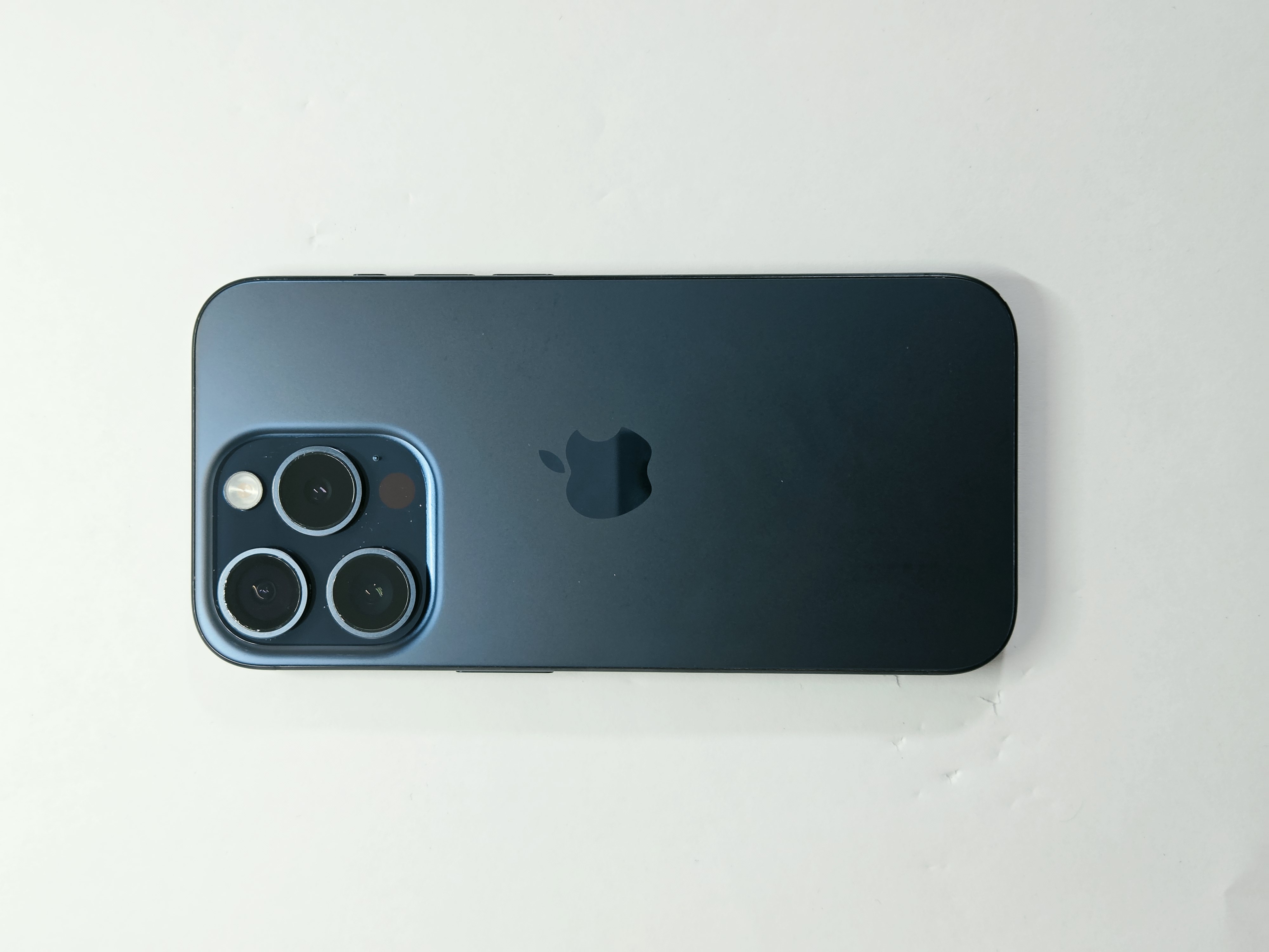 iPhone 15 Pro · Blue Titanium · 128 GB · Used · Excellent · Battery Health: 87% — photo 1 of 4