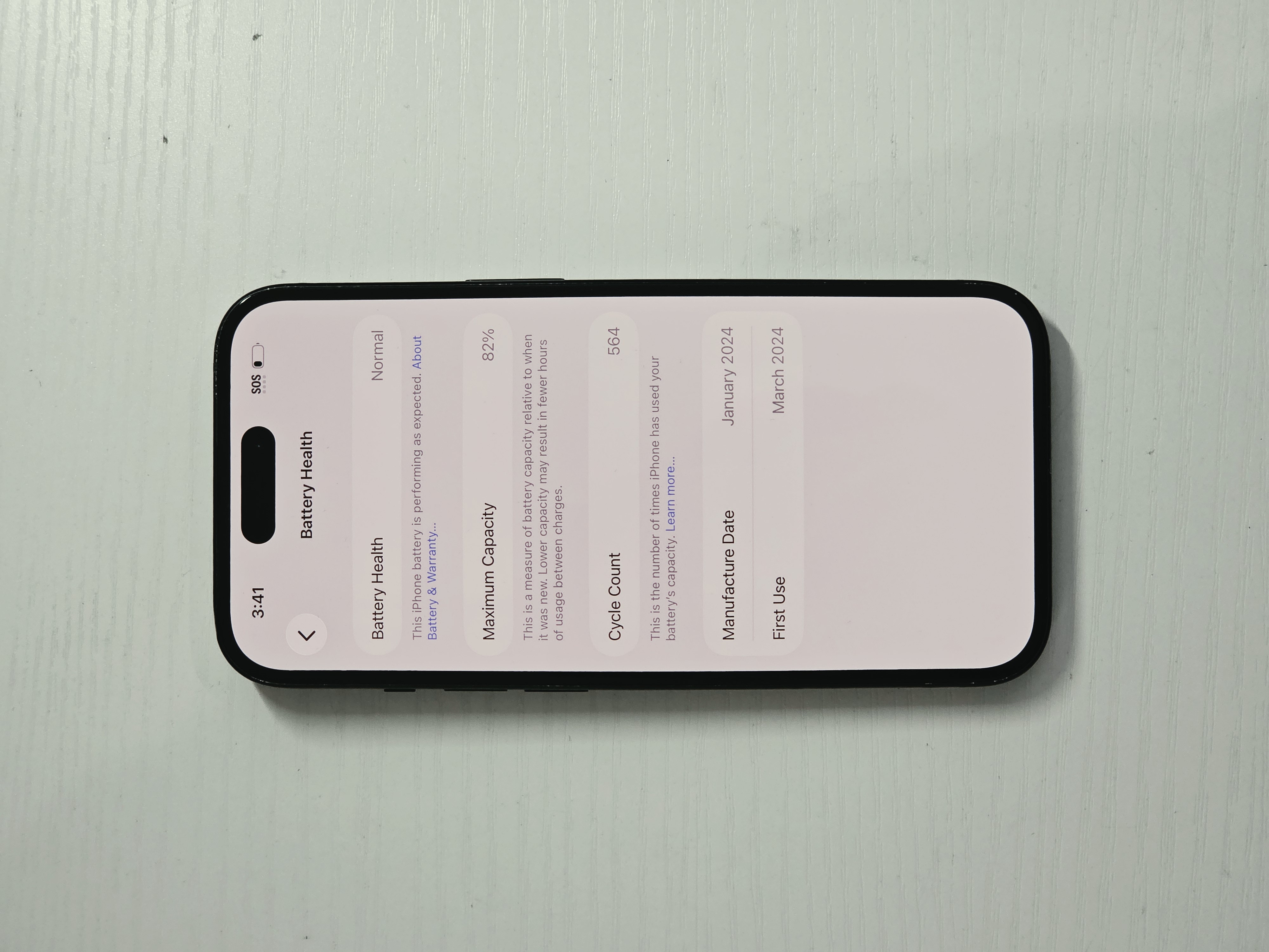 iPhone 15 · Black · 128GB · Used · Excellent · Battery Health: 82% — photo 3 of 4