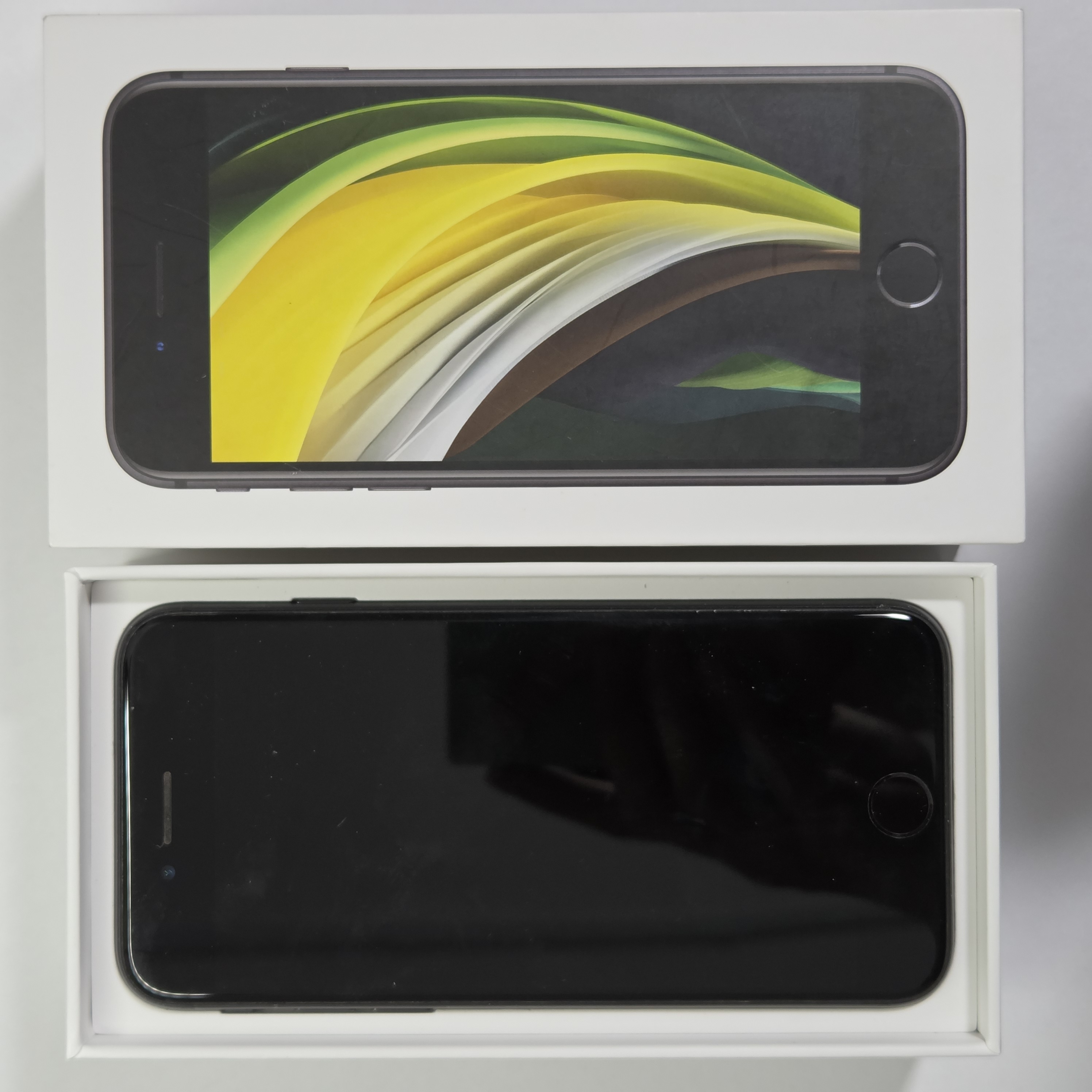 iPhone SE (2020) · Black · 64 GB · Used · Excellent · Battery Health: 84% · Previous Repairs — photo 2 of 4