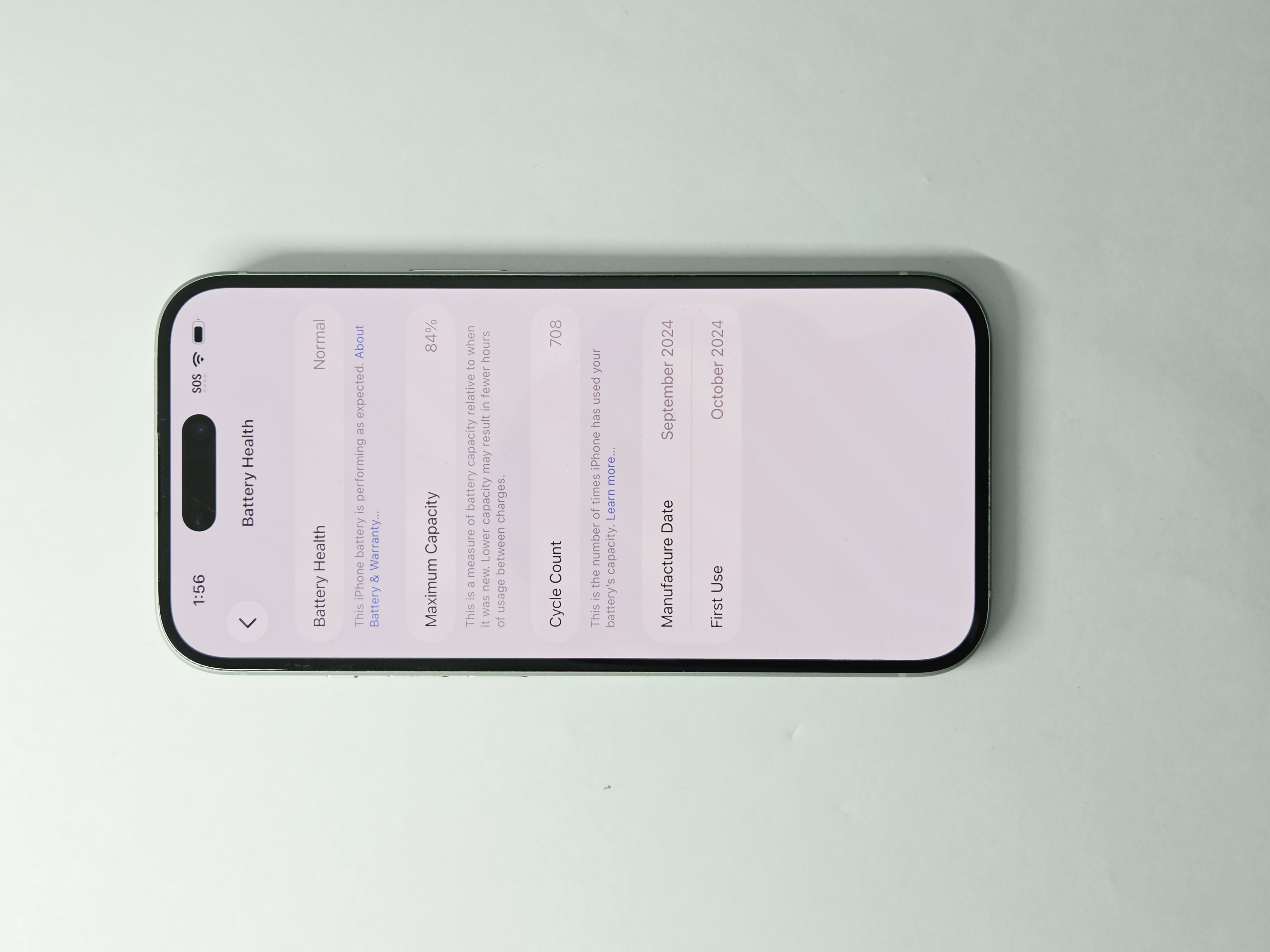 iPhone 15 · Green · 128 GB · Used · Excellent · Battery Health: 84% — photo 3 of 4