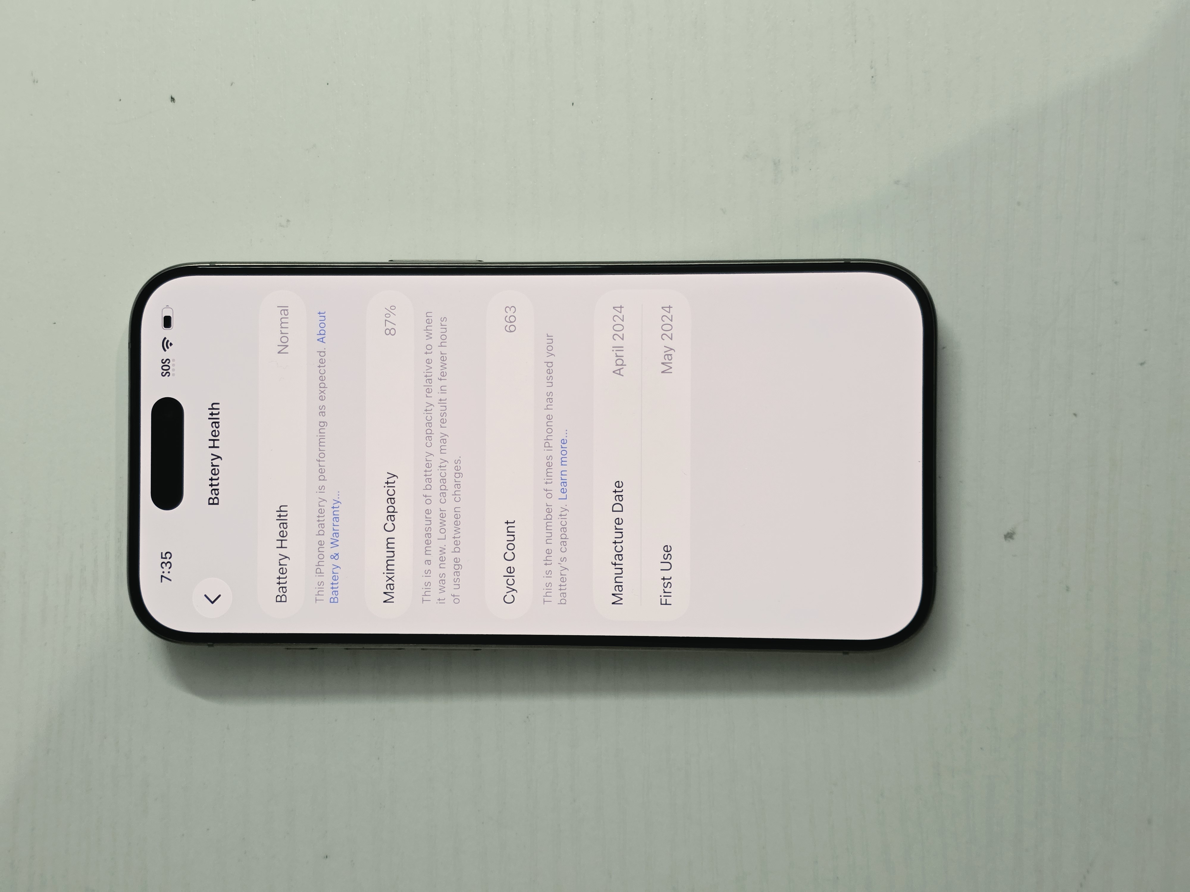 iPhone 15 Pro · Natural Titanium · 128 GB · Used · Like New · Battery Health: 87% · Previous Repairs — photo 4 of 4